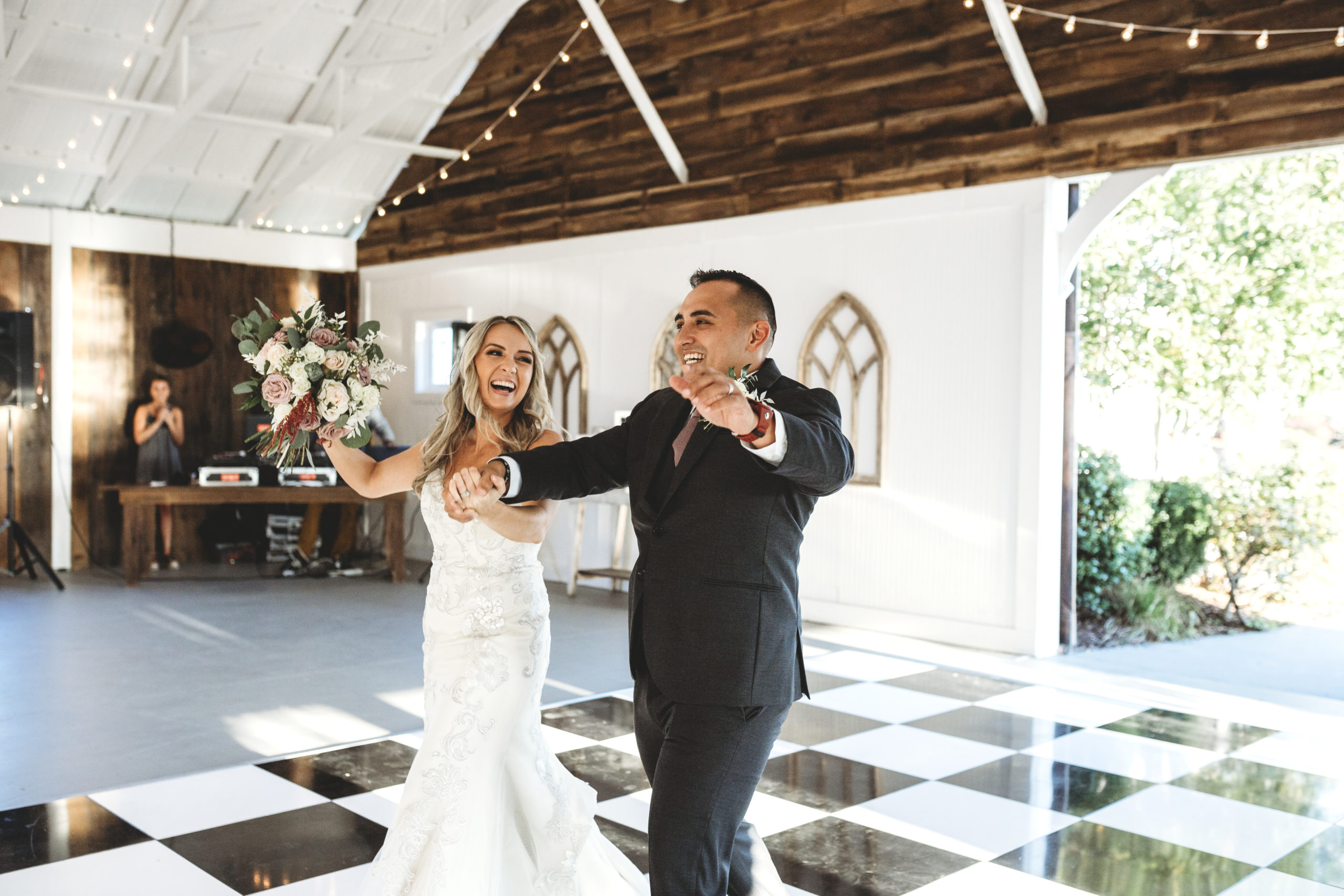 Couple walking into their wedding reception venue in Nashville