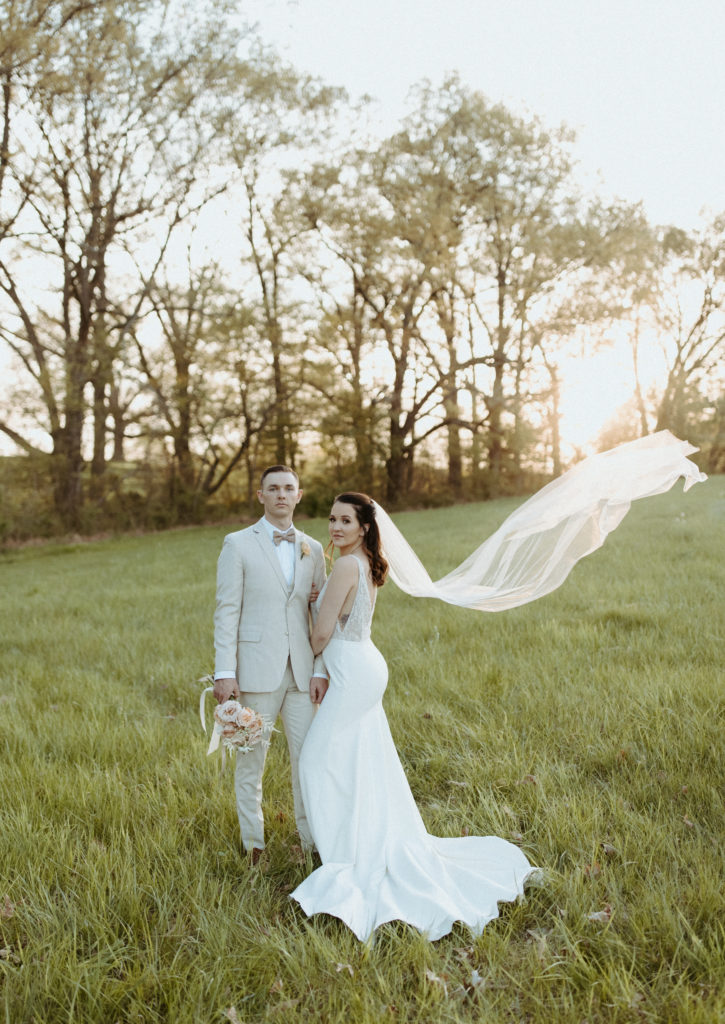 Dreamy bridal portraits outside L & L farm at sunset during a spring styled shoot.