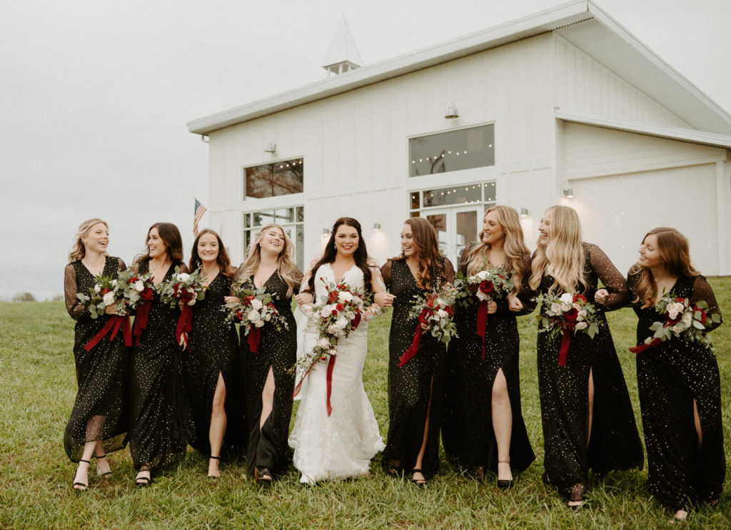 Shelby and her bridesmaids walking together. 