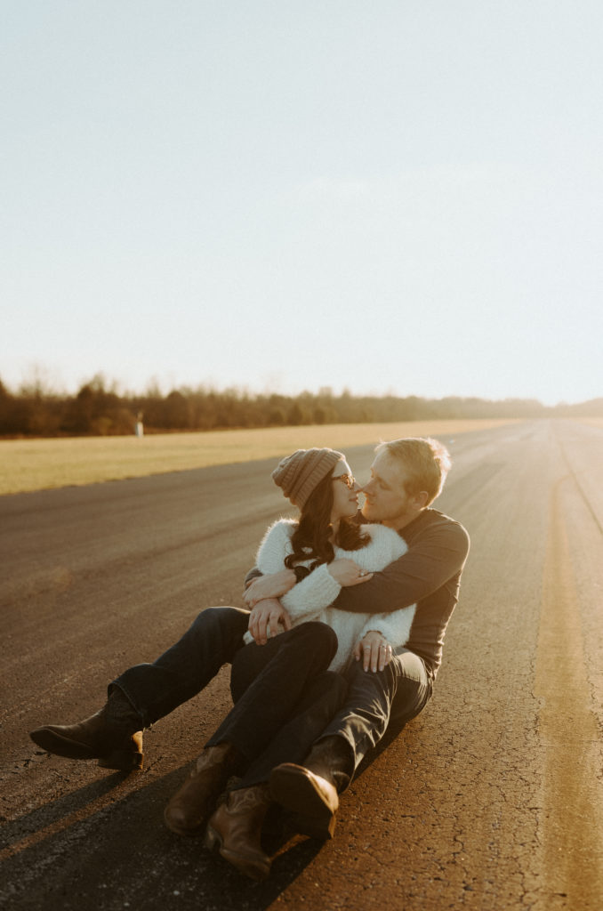 Glowy sunset portraits during an engagement session at Fort Cornelia Airport in Nashville, Tennessee.