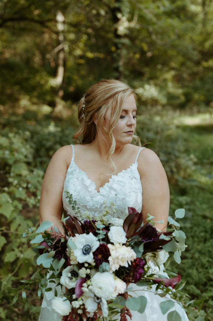 Kayla holding her bouquet from her wedding day at The Wedding Woods in Lebanon, Tennessee. 