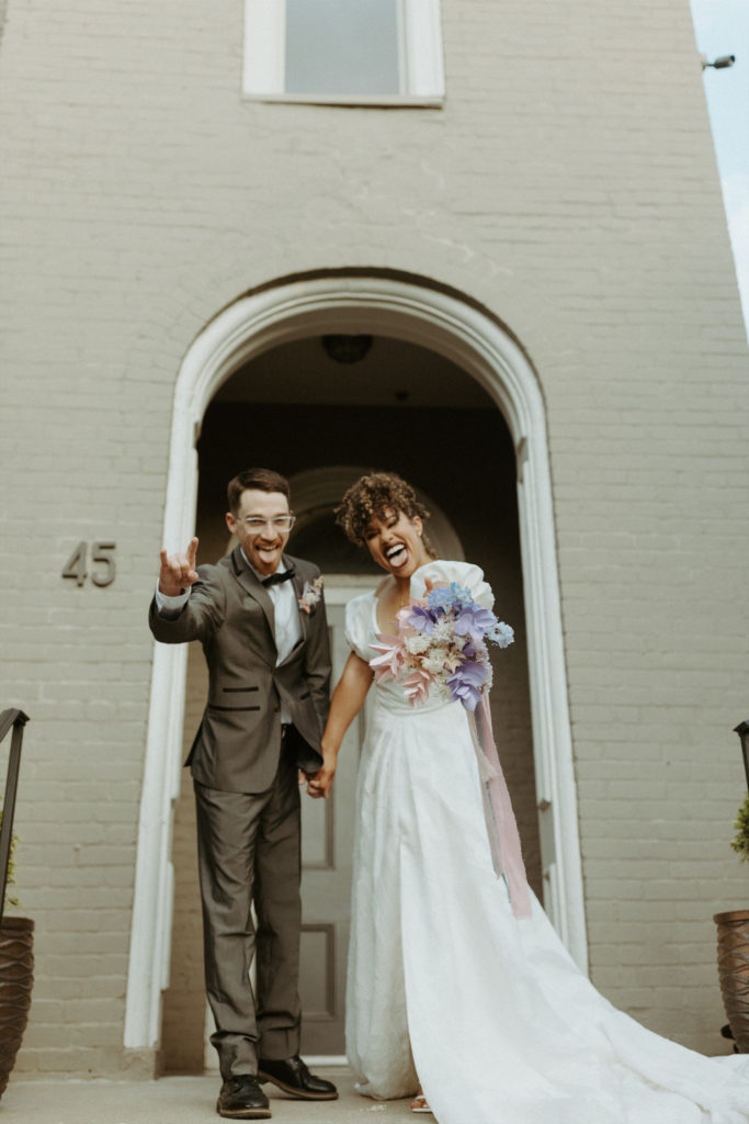 Bride and groom goofing around at a Nashville wedding venue.