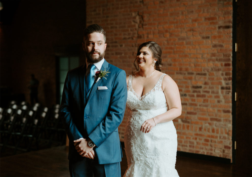 Marissa and Ryans first look during their fall wedding at clementine hall. 