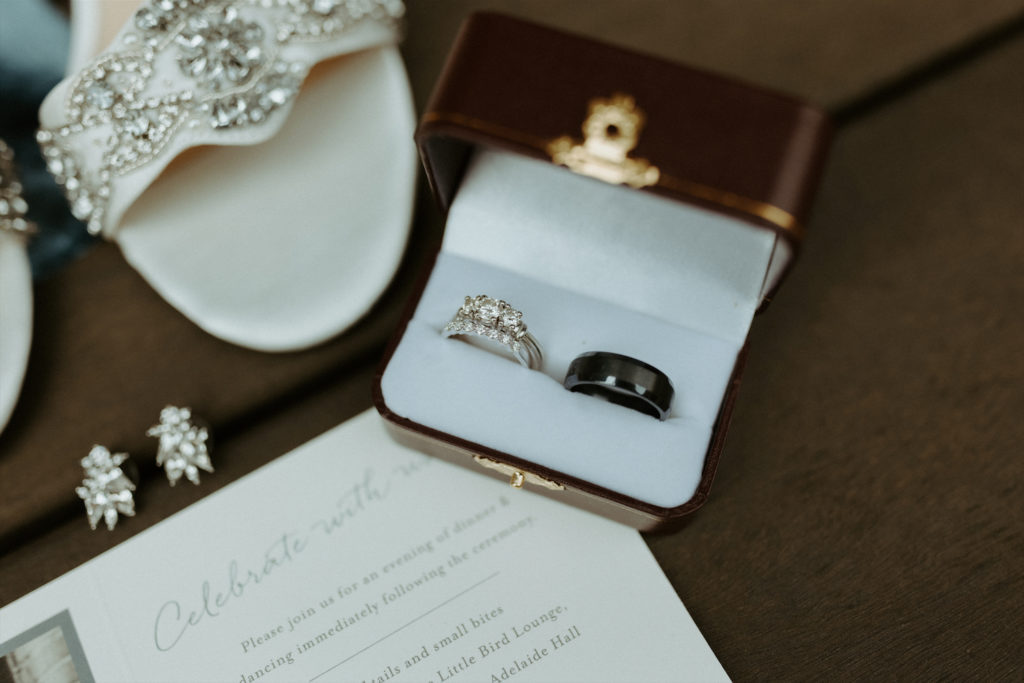 Marissa and Ryans wedding rings setup in the flatlay during their clementine hall wedding.