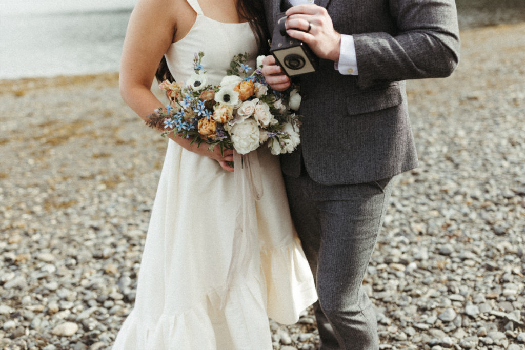Couple snuggled close after their wedding in Alaska 