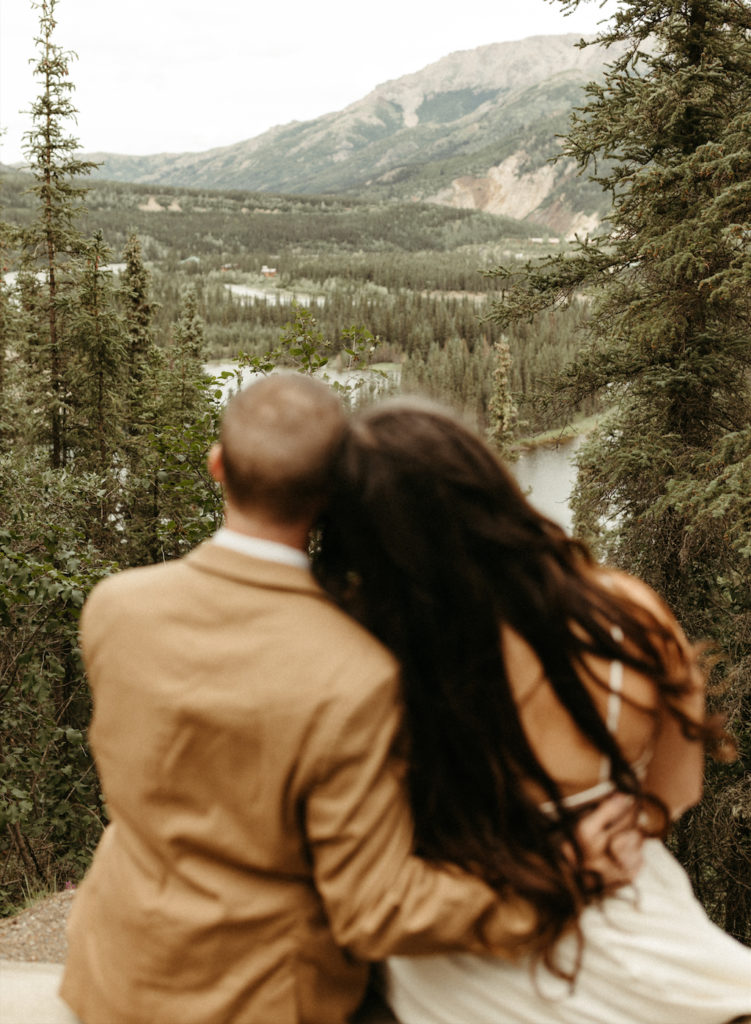 Couple looking at the mountains during their Denali National Park elopement.