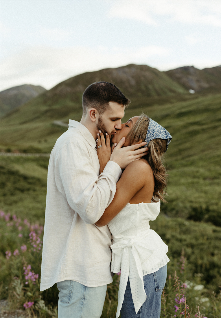 Couple kissing during their engagement photos in Hatchers Pass in Palmer Alaska  