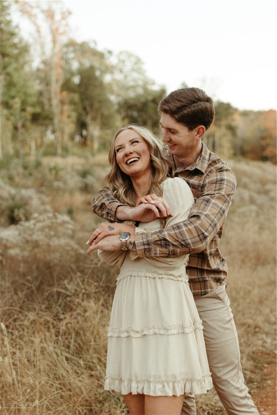 Couple snuggled close during an engagement session in Tennessee
