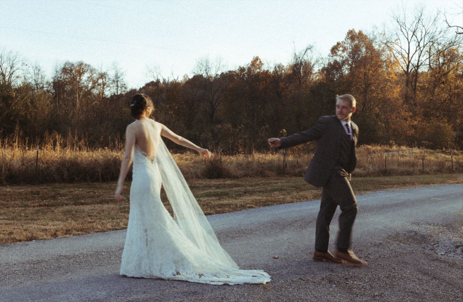 Couple walking past one another during their Tennessee wedding 