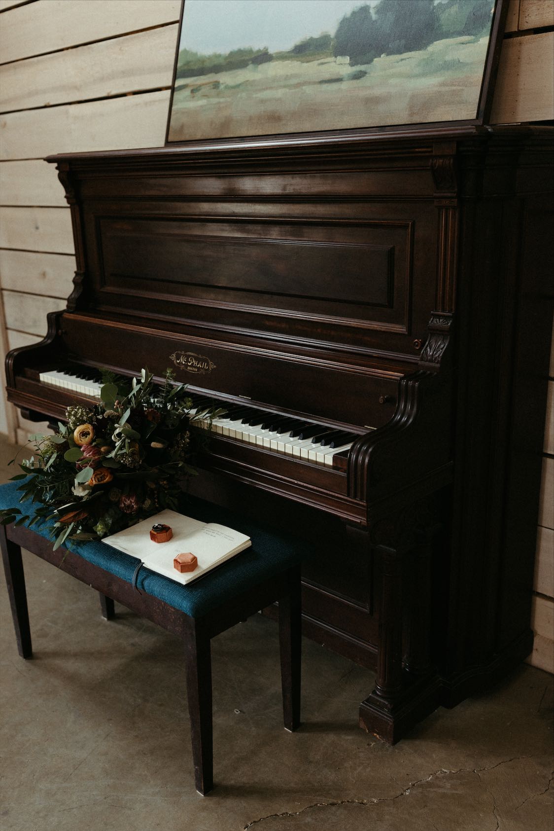 Wedding florals set on a piano for the couples Tennessee wedding 