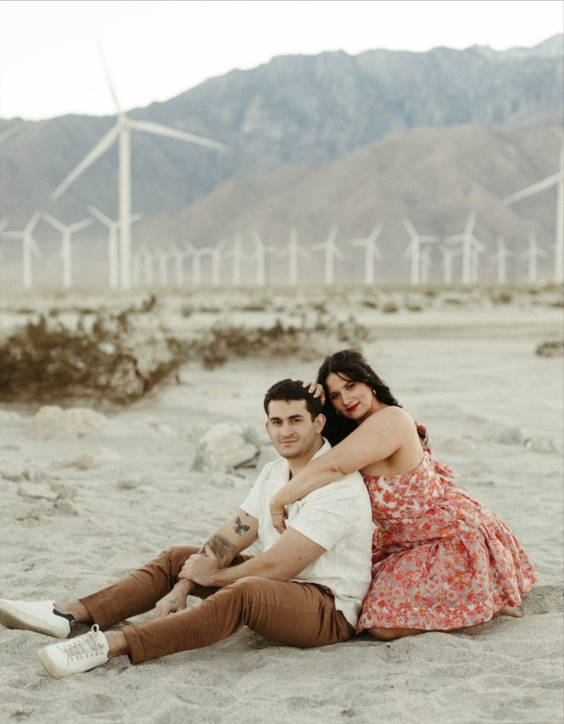 Couple snuggled close during their engagement  photos in Palm Springs 
