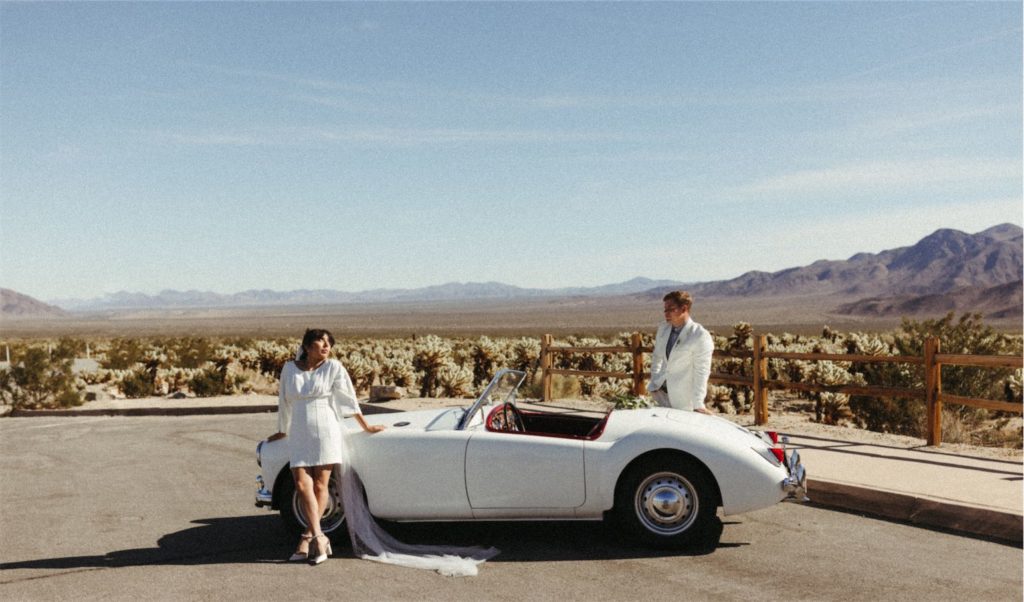 palm springs engagement photos featuring a vintage car