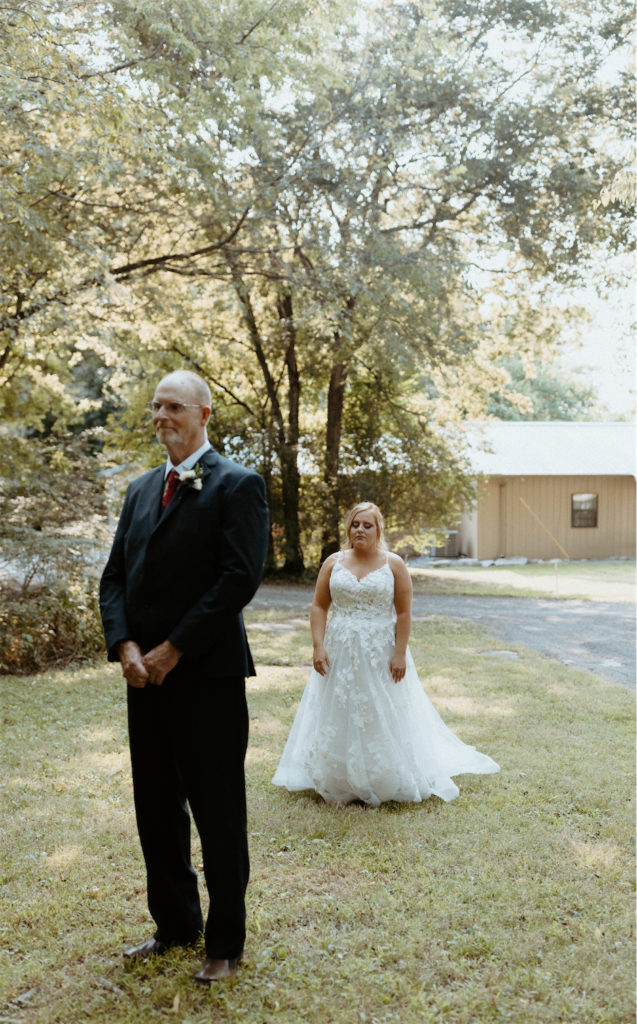 Bride walking up to see her father for the first time on her wedding day