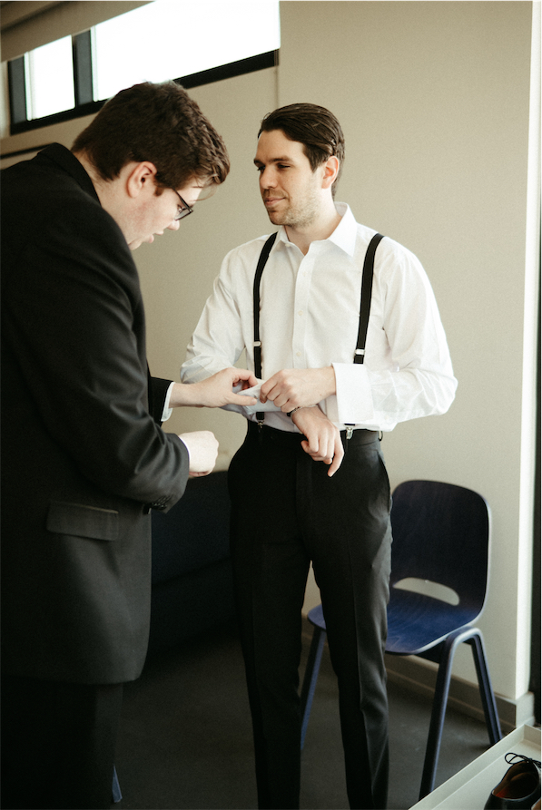 Grooms brother helping him get ready before heading over to the wedding venue The Cordelle