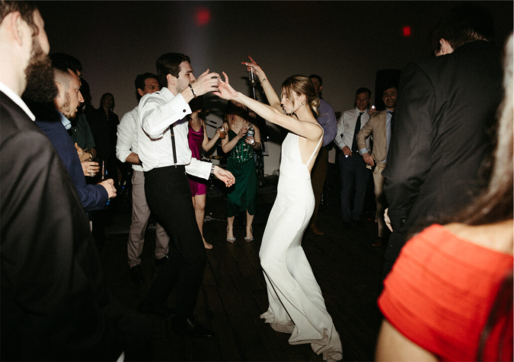 Bride and groom dancing together during their wedding day at The Cordelle