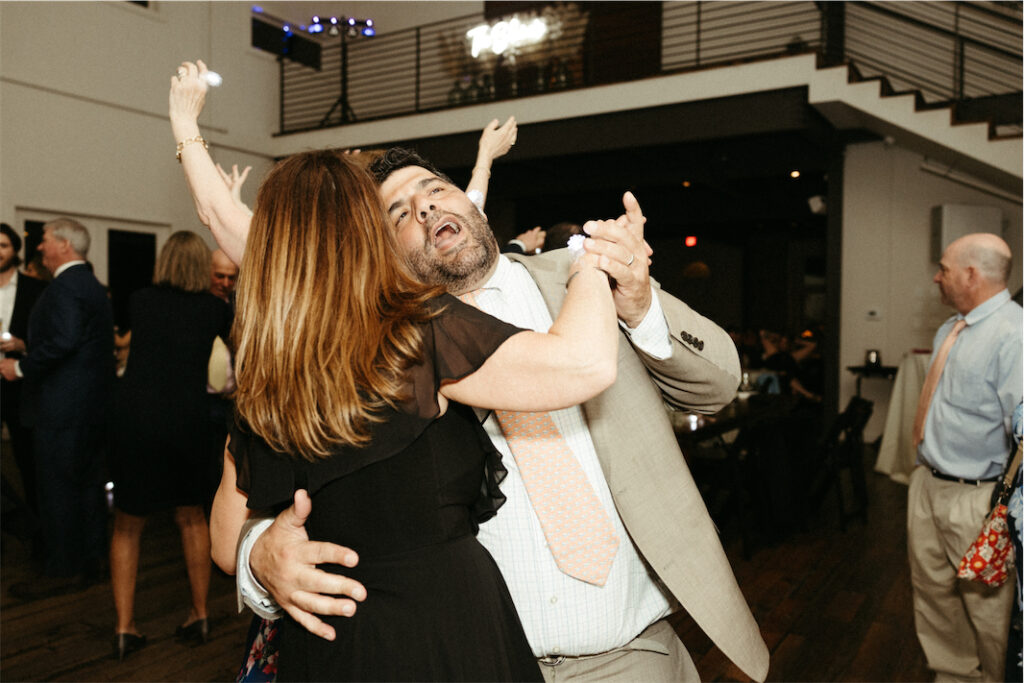 Couple dancing during the bride and grooms wedding reception