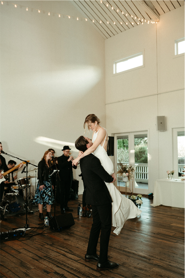 Band playing as the couple enjoy their first dance together as husband and wife