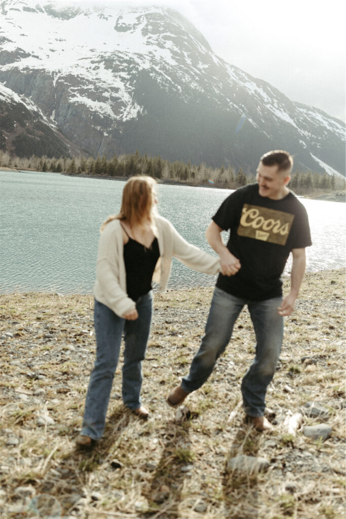 Couple holding hands during their Portage Lake Couples Session 