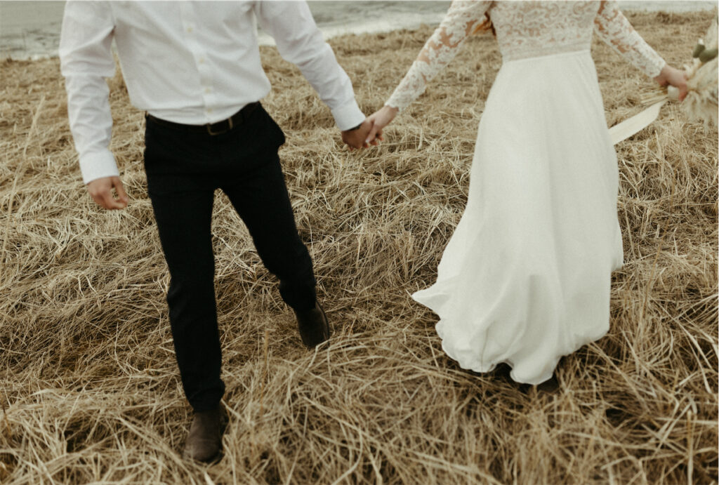 couple holding hands during their Girdwood alaska elopement