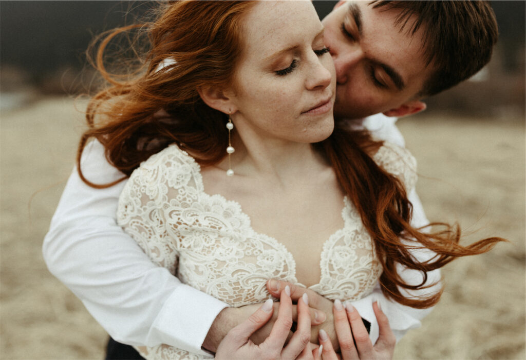 Man hugging a woman during their Girdwood alaska elopement