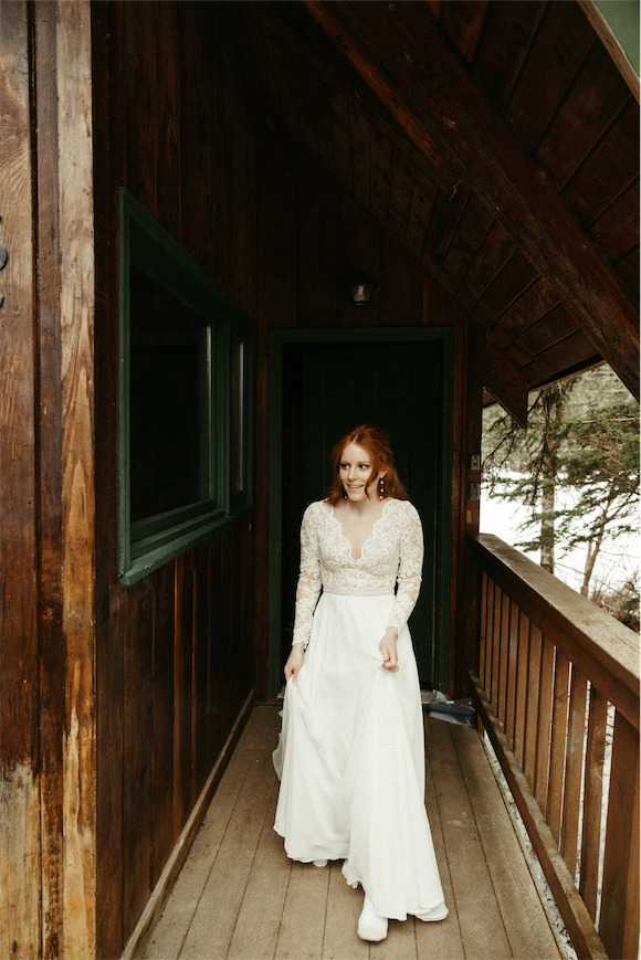Woman walking out for an elopement first look 