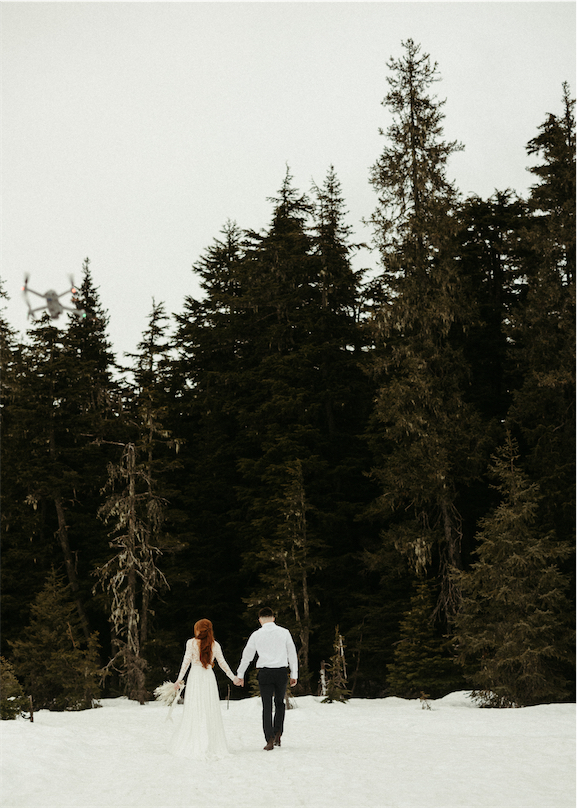 couple exploring together after getting ready at their a frame cabin
