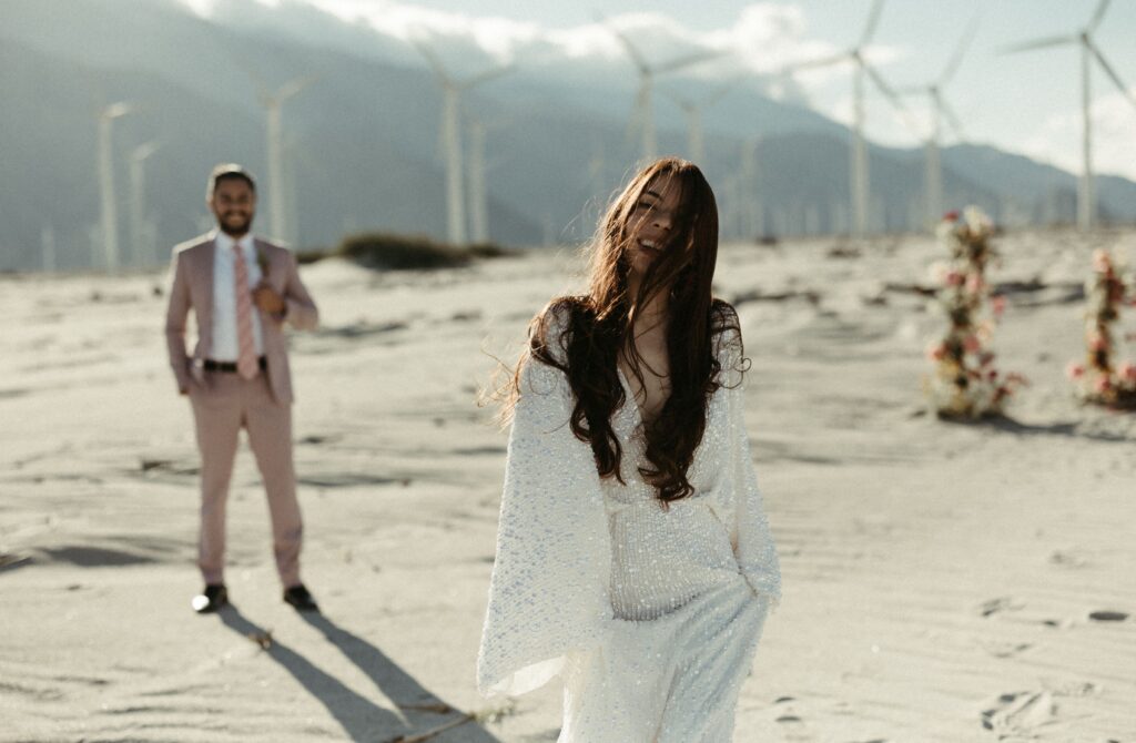 Couple running during the elopement in California 