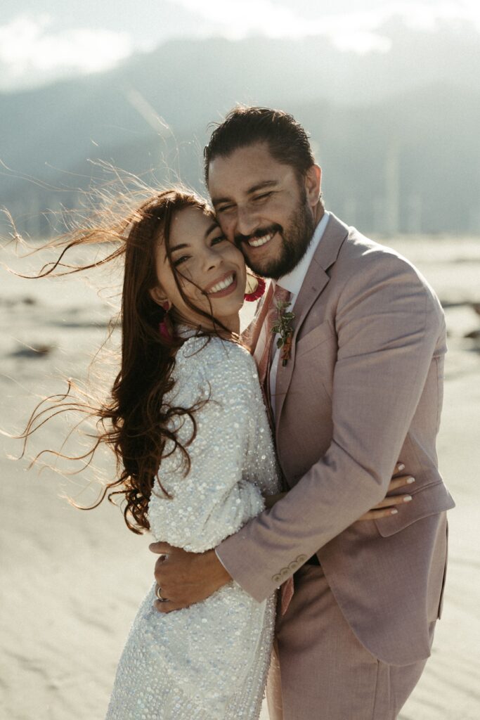 Man and woman snuggled close during their Palm Springs elopement 