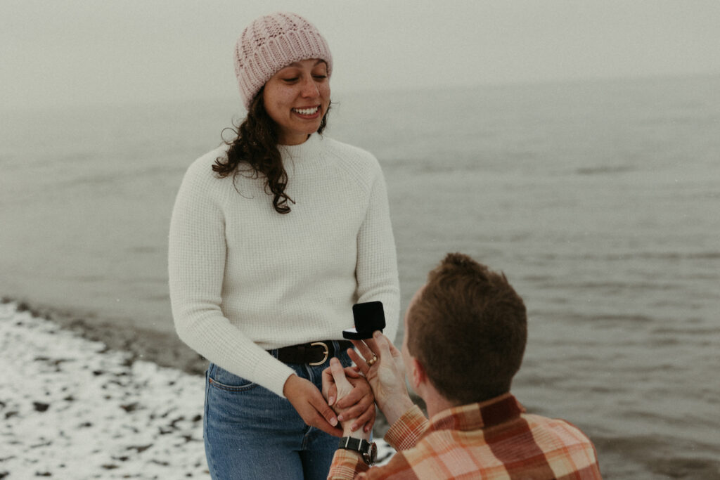 Woman holding back tears during a proposal