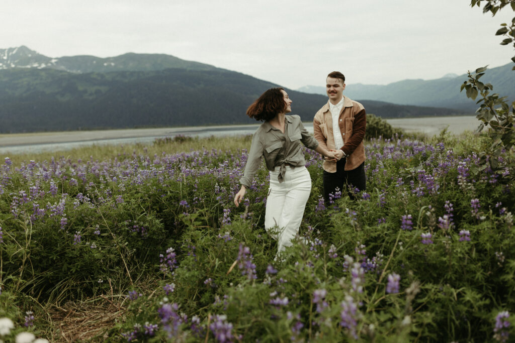 engagement photo shoot in a lupine field