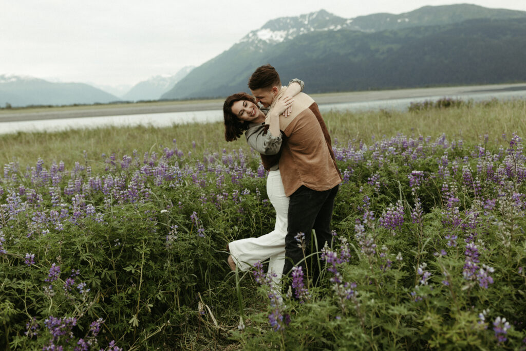 Couple hugging one another during their engagement photo shoot 