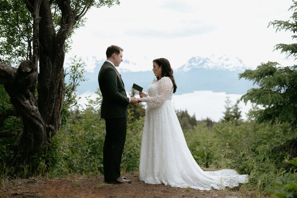 Couple holding hands and talking to one another.