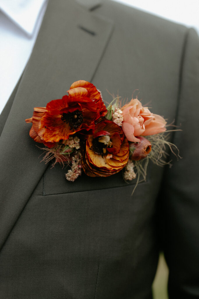 Florals on a green suit. 