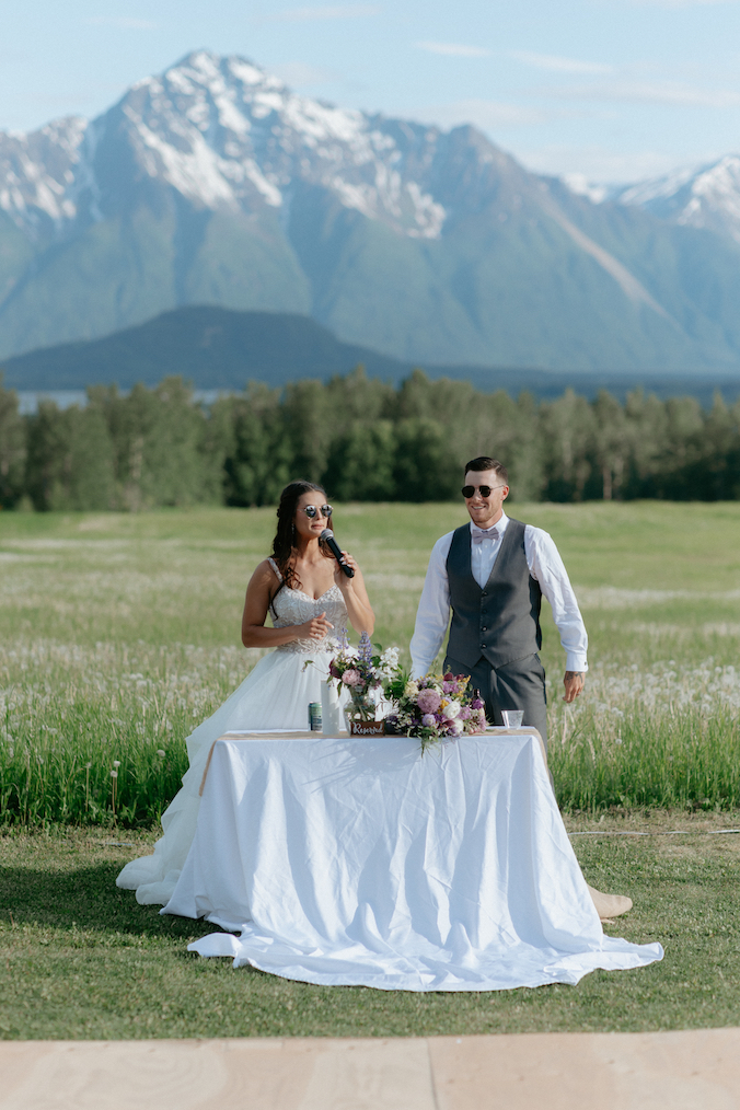 Couple thanking all of their family and friends for attending their Alaska wedding.