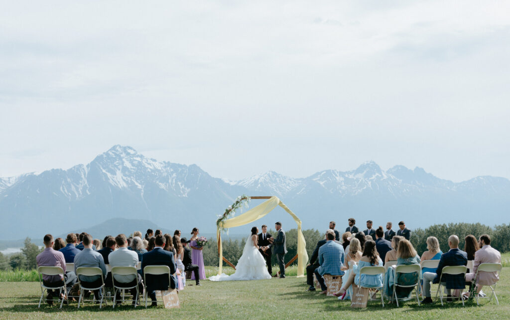 Wedding ceremony overlooking the mountains in Alaska.