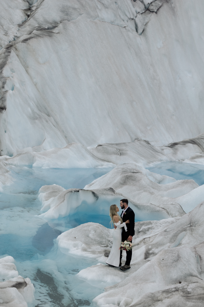 A couple getting married on Knik Glacier in Alaska