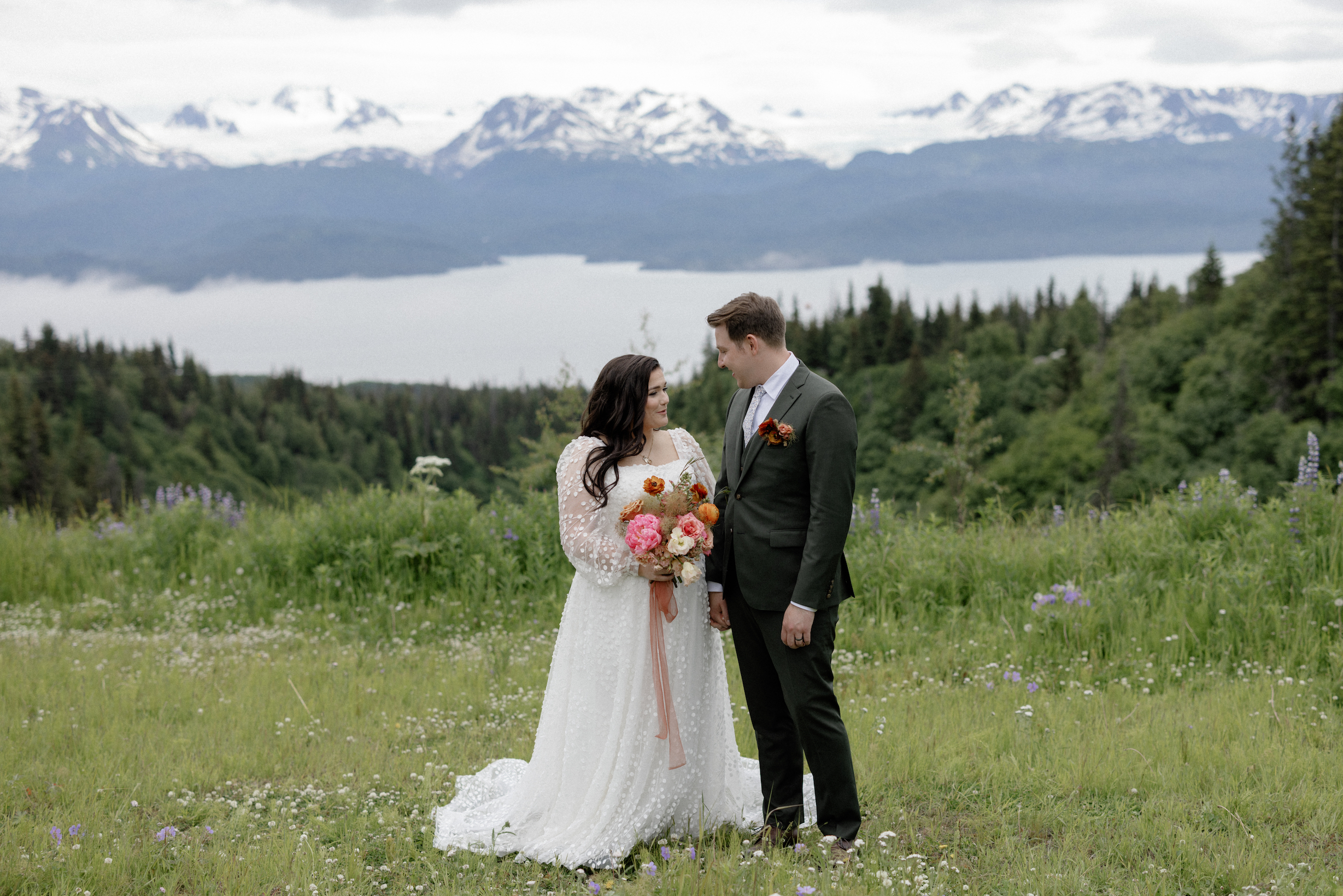 A bride and groom holding hands and after getting married at AK Diamond Ranch. 