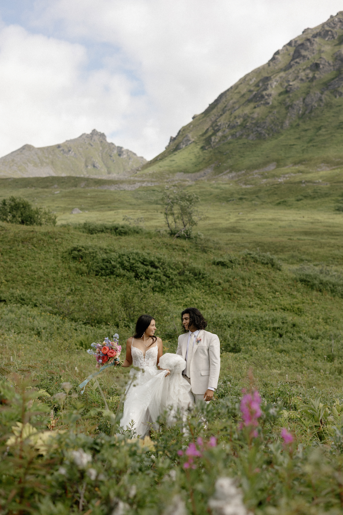A couple getting married in the mountains. 