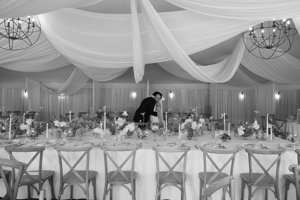 A couple seeing their reception space for the first time during their wedding.